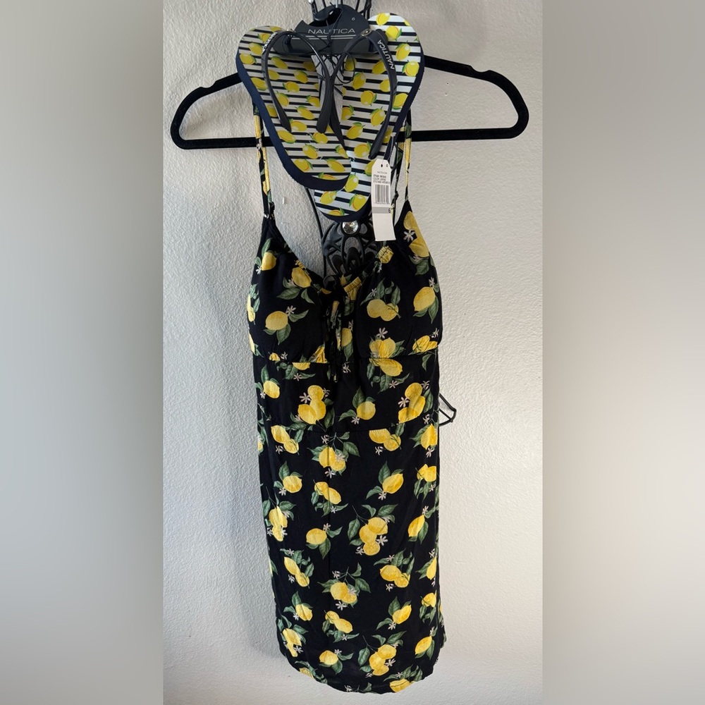 New with lemon shirt :)
Nautica women’s small flip-flop with lemon & tank new :)